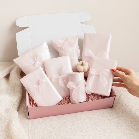 verjaardag cadeautjes in roze cadeaubox